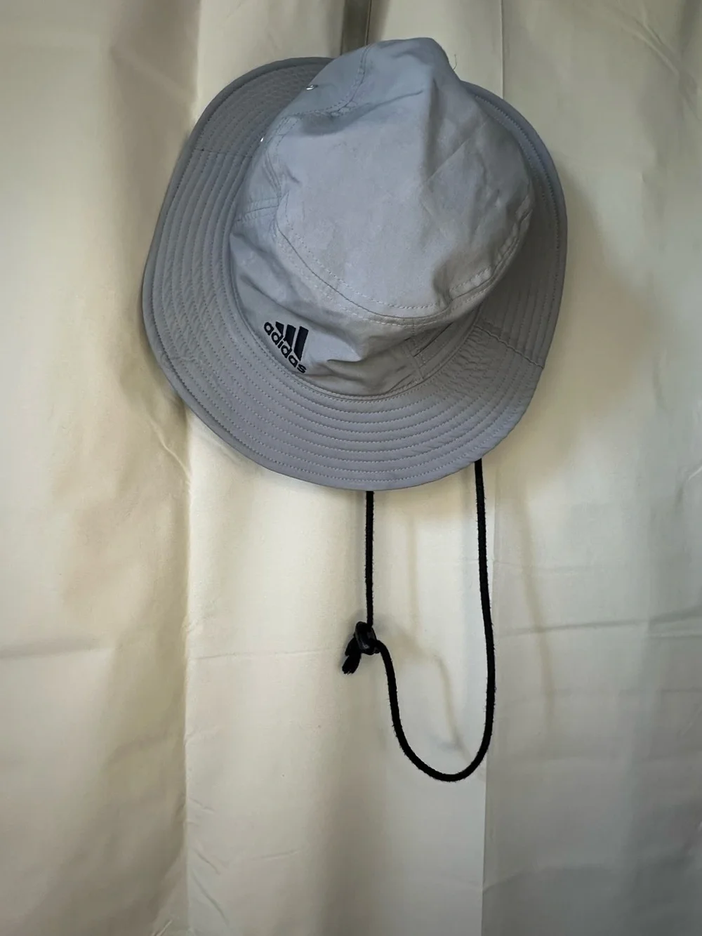 adidas Victory Bucket Hat in grey.